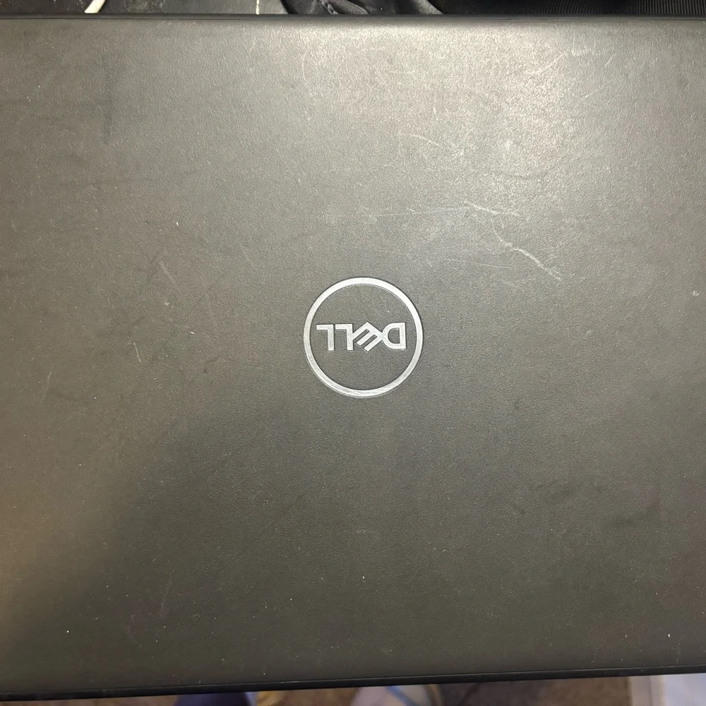 Dell Black Professional Laptop with QWERTY Keyboard and Sleek Design